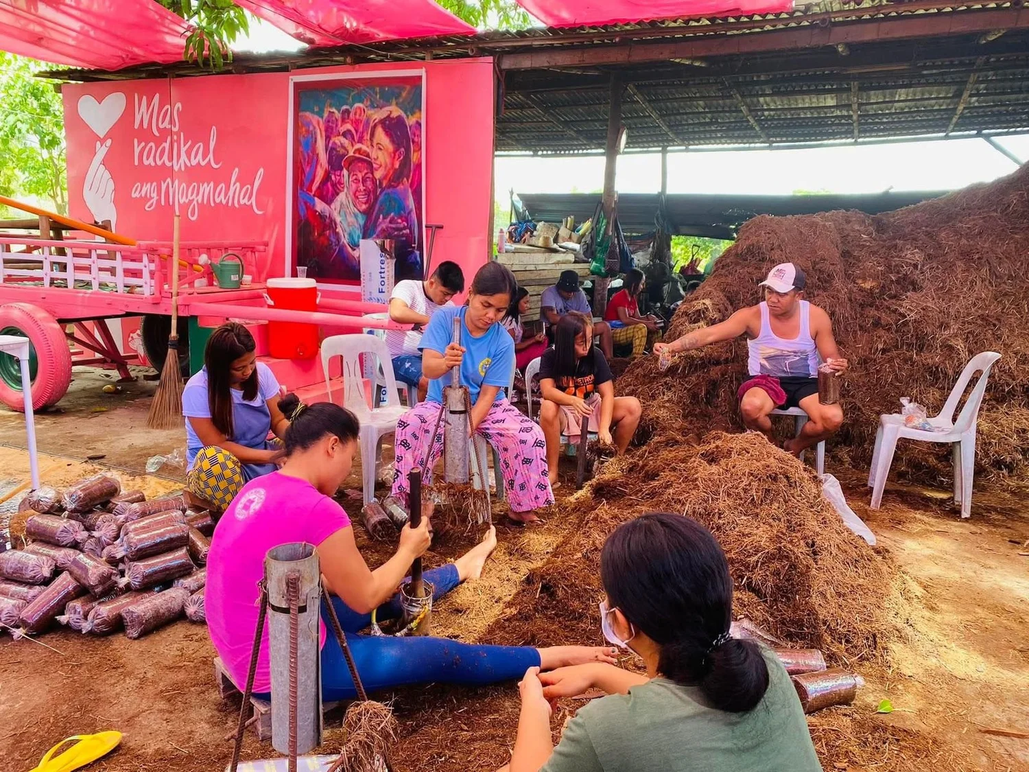 Participants preparing mushroom growing bags during an Ako Ang Saklay livelihood project